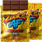 Zook'd AF Peanut Butter Chocotryp bar pouches with a chocolate bar on top